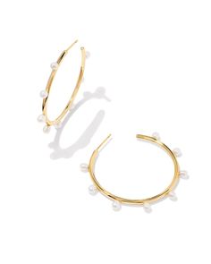 Your beloved hoop style gets a shimmering refresh with the Leighton Gold Pearl Hoop Earrings in White Pearl. The unique silhouette allows the cultured freshwater pearls to stand out while you show off your trendsetting style.Metal14k Gold Over BrassMaterialWhite PearlClosureEar PostSize1.86"L X 1.73"WMaterial Highlight Pearl Strands Necklace, Pearl Chain Necklace, Pearl Hoop Earrings, Pearl Strands, Freshwater Cultured Pearls, Pearl Chain, Brass Material, Silver Pearls, Gold Pearl