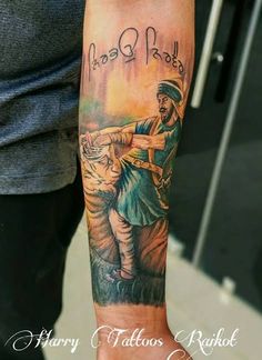 a man with a baseball tattoo on his arm