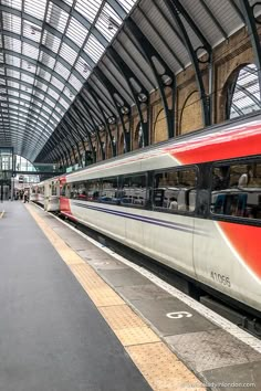 the train is stopped at the station waiting for passengers