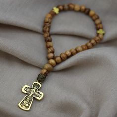 Authentic Olive Wood Prayer Beads made from Vintage Bethlehem Olive Wood that is 1000 + years old.  Prayer Beads are set on Coyote colored Micro Paracord for durability.  Beautiful gift for Baptism or for personal use with the Jesus Prayer.  Custom orders are very welcome.  🌹 Mary Paracord Rosary, Prayer Bracelet, 1000 Years, Jesus Prayer, Eastern Orthodox, Amethyst Beads, Bethlehem, Prayer Beads, Olive Wood