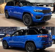 two different views of the new jeep grand cherokes xe high altitude, which is on display at an auto show