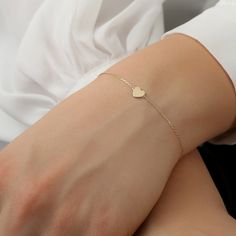 Solid Gold Heart Bracelet, Delicate Bracelet, Dainty Bracelet, Small Heart Bracelet 14k Rose, White, Yellow Gold, Gift for Her Lilliana Solid Gold Handmade The dimension of the Heart: 5.5x7.5mm Available 14K White, Yellow, Rose Gold ( SOLID GOLD ) Please note. The adjustable option is available upon request. Please see the Personalization box under the drop-down menu. Orders with free shipping go out with USPS First Class Mail tracking. We require a signature for orders more than $500. If you ne Classic Heart Charm Bracelet For Wedding, Elegant Everyday Heart-shaped Bracelets, Elegant Everyday Heart Bracelets, Delicate Rose Gold Heart Bracelet For Everyday Wear, Elegant White Gold Heart Bracelet With Charm, Delicate Rose Gold Heart Bracelet For Everyday, Classic Wedding Heart Charm Bracelet, Minimalist 14k Gold Heart Bracelet For Valentine's Day, Minimalist 14k Gold Bracelet With Heart Charm