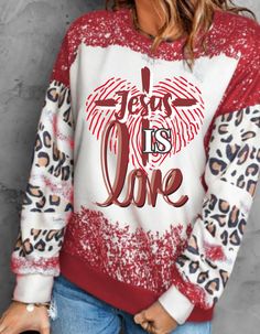 This leopard spotted red sweater is an absolute cutie! Perfect for staying warm and cozy paired with your go-to jeans and boots, or keep it casual with some sneakers. Design Inspiration: When people look at us, they should see Jesus, that we have the DNA of Jesus and have been marked by His life: forever changed and not the same. May the love of Jesus in us be easy to spot amidst a sea of people, to draw them to their Father in heaven who loves us deeply. Galations 2:20 I have been crucified with Christ; and it is no longer I who live, but Christ lives in me; and the life which I now live in the flesh I live by faith in the Son of God, who loved me and gave Himself up for me. Red Letter Print Sweater For Fall, Casual Red Sweater With Graphic Print, Casual Leopard Print Sweater, People To Draw, Sneakers Design, Leopard Spots, Red Sweater, Son Of God, Heavenly Father