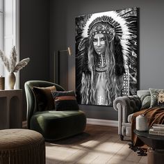 a living room filled with furniture and a native american painting on the wall above it