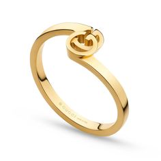 From Gucci, this GG Running ring is crafted in 18k yellow gold and features a design inspired by vintage Gucci logo designs. Boasting a bypass silhouette, this ring showcases a GG logo in the center. The band measures 0.75 inches in width and the GG motif is 0.3 inches in width and 0.20 inches in height. Made in Italy. This ring is a size 6.75. Gucci Style #: YBC457122002014 Top Jewelry Trends, Gucci Yellow, Yellow Gold Stacking Rings, K Ring, G Ring, Fine Gold Jewelry, Gucci Jewelry, Long Pearl Necklaces, Stack Ring