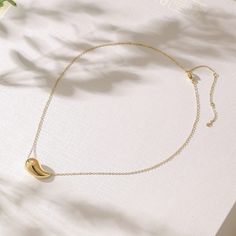 Durable and stylish, our waterproof necklace crafted for both functionality and fashion. Perfect for any occasion, it's the ideal accessory for those who appreciate durability and timeless elegance. Perfect for the minimalist and a beautiful piece to layer with. A true versatile statement piece that you can wear straight from the pool to dinner! - 18K gold plated / stainless steel - Waterproof technology - Hypoallergenic Modern Necklace With Adjustable Length For Gift, Chic Necklace With Adjustable Length For Gift, Adjustable Minimalist Necklace For Everyday, Minimalist Adjustable Everyday Necklaces, Modern Adjustable Necklace As Gift, Modern Adjustable Length Necklace For Gift, Minimalist Teardrop Cable Chain Necklaces, Minimalist Teardrop Necklaces With Cable Chain, Minimalist Teardrop Necklace With Cable Chain