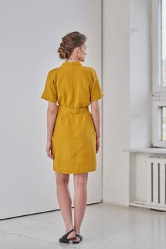 "MsWrinkle's clothing - from human to human. 100% handmade. *Description* - Kimono sleeve wrap dress with belt and pockets; - High quality European linen; - Washed and softened (doesn't shrink anymore); - Medium weight linen (150 g/m2); - Our linen is OEKO-TEX certified that meets human ecological safety requirements; - Model is wearing size S in honey yellow and forest green color (other sizes and colors please choose on the right); - Not transparent; - Not ironed and we suggest to use tumble d Fitted Belted Linen Dress, Yellow Linen Short Sleeve Dress For Summer, Short Sleeve Linen Mini Dress For Beach, Linen Tunic Dress For Work, Linen Shirt Dress For The Beach, Linen Belted Dress For Daywear, Linen Tie Waist Dress For Work, Linen Workwear Dress With Tie Waist, Knee-length Linen Mini Dress For Work