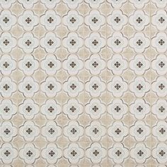 a white and brown wallpaper with an intricate design on it's surface,