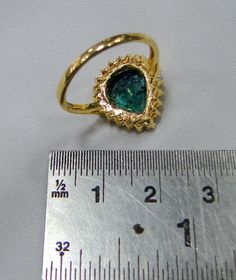 Emerald Ring, vintage18 K solid gold hallmarked, Natural emerald Diamond gemstone ring. Beautiful collection piece in very good condition. USA ring size -7.5 ( we can adjust size), size of top-16.5/15.5 mm, emerald weight-4 carat, diamond weight-0.63 carat VS G. Gold Teardrop Emerald Ring, Pear-shaped Emerald Ring For Anniversary, Pear-shaped Gold Emerald Ring, Pear-shaped Emerald Anniversary Ring, Gold Emerald Pear-shaped Ring, Gold Pear-shaped Emerald Ring, Pear-shaped Emerald Rings, Gold Emerald Pear-shaped Ring For Anniversary, Gold Pear-shaped Rings With Bezel Setting