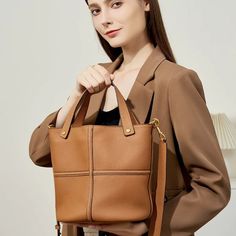 Meet your new go-to bag - the Genuine Leather Large Capacity Bucket Shoulder Bag. Made with high-quality genuine leather, it's not only stylish but also durable. Its spacious interior and zipper closure keep all your belongings organized and secure. Perfect for everyday use in a casual setting. Your browser does not support our video. Premium Genuine Leather – Crafted from high-quality leather for durability and timeless style. Spacious & Secure – Large capacity with a zipper closure to keep you Multifunctional Leather Bags For On-the-go, Multifunctional Leather Bag For On-the-go, Versatile Leather Satchel With Zipper Closure, Multifunctional Brown Rectangular Shoulder Bag, Versatile Leather Bucket Bag With Zipper Pocket, Leather Bucket Bag With Zipper For Daily Use, Rectangular Leather Bucket Bag With Zipper Closure, Versatile Large Capacity Leather Bucket Bag, Versatile Leather Bucket Bag With Large Capacity