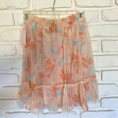 Nwt. New With Tags. Lauren Conrad Lc Floral Swing Skirt. Size Small. Polyester. Peach Under Liner. Very Roomy, Flowy Nice Soft Material. Elastic Waist Band. Dimensions 12 Inch Waist 18 1/2 Inch Length. Original Price $44 Kohl’s. Smoke Free Home. Orange Ruffled Skirt For Spring, Spring Orange Ruffled Skirt, Chic Peach Skirt For Spring, Flowy Orange Skirt For Spring, Orange Mini Skirt For Beach In Spring, Orange Mini Skirt For Spring Beach Outing, Orange Mini Skirt For Spring Beach Occasion, Spring Orange Mini Skirt, Orange Mini Skirt For Beach And Spring