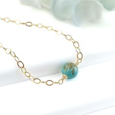 Turquoise is a popular stone that has long been prized in many cultures. It is said to bring luck, peace, and protection, and is also one of the birthstones for December. This bracelet is simple and delicate - perfect to wear every day! Wear it alone or layered with other bracelets. MATERIALGold filled chain and componentsGenuine turquoise bead SIZE8mm turquoise bead8-inch bracelet CLOSURESpring ring clasp WHAT IS GOLD FILLED?We used to have just 2 choices: pure gold or gold plated. The first wa Spiritual Turquoise Jewelry For Everyday, Everyday Spiritual Turquoise Jewelry, Dainty Turquoise Gemstone Bracelets, Turquoise Amazonite Bracelet Gift, Turquoise Birthstone Bracelet, Everyday Turquoise Gemstone Bracelets, Hypoallergenic Amazonite Jewelry As Gift, Minimalist Everyday Amazonite Jewelry, Everyday Minimalist Amazonite Jewelry