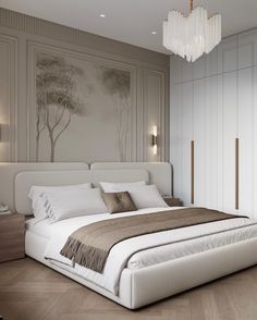 a large white bed sitting in a bedroom next to a wall mounted painting on the wall