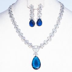 Daria Sapphire Blue Modern Necklace & Earring Set by Jaipur Rose Designer Indian Jewelry - Jaipur Rose Luxury Jewelry Sets With Sparkling Stones For Formal Occasions, Luxury Jewelry Sets With Sparkling Stones For Formal Events, Luxury Formal Jewelry Sets With Sparkling Stones, Elegant Sapphire And Diamond Jewelry Sets, Classic Teardrop Jewelry Sets For Formal Occasions, Elegant Sapphire Jewelry Sets For Party, Elegant Sapphire Necklace With Hand Set Details, Elegant Blue Jewelry Sets With Diamond Accents, Elegant Crystal Jewelry Sets For Formal Occasions