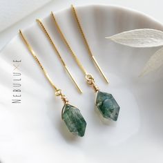 💚 Discover the ethereal allure of moss agate with our stunning threader earrings. Adorned with captivating moss agate stones, these threaders effortlessly blend elegance with nature's beauty. Choose from three exquisite finishes and designs, each crafted to accentuate your unique style. Elevate your look with the earthy charm of moss agate, exuding timeless sophistication in every wear 💚 ⭒ Ball Studs:  4mm ball/15mm post * 925 Sterling Silver ⭒ Ball Stud pushbacks: butterfly backing encased in Moss Agate Jewelry, Crystal Stone Jewelry, Long Chain Earrings, Earrings Gold Hoop, Crystal Hoop Earrings, Agate Earrings, Hoop Earrings Gold, Earrings Crystal, Threader Earrings