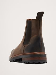 We reimagined the classic Chelsea boot in a sleek, simplified silhouette to better showcase this beautiful, burnished Italian leather.  This style has the easy, elastic panel construction of the originals and is crafted in Portugal.  Italian leather uppers and leather lining.  Blake-stitched rubber lug soles.  Premium foam cushioned footbed.  Elastic side panels.  Made in Portugal.  Whole and half sizes. Vegetable-tanned Leather Chelsea Boots With Round Toe, Rugged Leather Chelsea Boots With Plain Toe, Brown Leather Moc Toe Chelsea Boots, Brown Leather Chelsea Boots Moc Toe, Formal Oiled Leather Boots For Fall, Rugged Brown Leather Chelsea Boots, Rugged Leather Chelsea Boots For Business, Vegetable-tanned Leather Boots With Plain Toe, Business Boots With Oiled Leather And Leather Lining