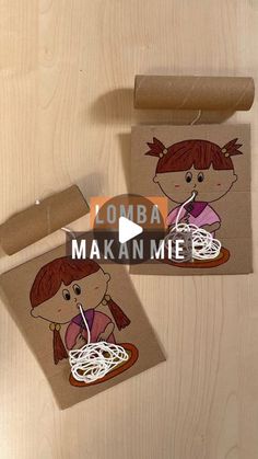 two brown paper bags with stickers on them and the words lomba makan me