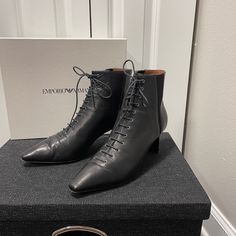 $575+Emporio Armani Black Nappa Leather Ankle Lace Up Boots Sz It 40/Us 9.5 -Pre-Owned In Good Condition With Signs Of Wear Mostly On The Soles -Very Soft Nappa Leather Upper -Leather Insole -Leather Sole -Made In San Marino -Shaft:Approx.5" -Heel:Approx.2.5" Formal Calf Leather Ankle Lace-up Boots, Formal Low Heel Lace-up Boots For Fall, Formal Leather Lace-up Boots With Pointed Toe, Formal Calf Leather Lace-up Boots, Elegant Leather Lace-up Boots For Formal Occasions, Elegant Business Lace-up Ankle Boots, Elegant Almond Toe Lace-up Boots For Business, Elegant Evening Ankle Lace-up Boots, Designer Calf Leather Heeled Boots With Square Toe