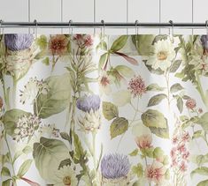 a shower curtain with flowers on it