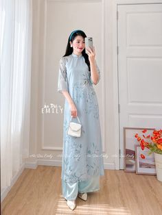 🌻Material: Voan Tơ Stretchy level: 0/10 🌻 The measurement of this ao dai (long dress) is in Vietnamese size (American size tends to be bigger for the same size). Please LOOK AT THE SIZE CHART CAREFULLY BEFORE ORDERING. There might have some chalk writings on the fabric due to making process. These marks can be washed away easily. 🌻🌻No returns or exchanges Buyer can contact seller about any issues with an order. 🌸 Follow us Facebook/aodaiemily www.aodaiemily.com 💜 Thank you very much!💜 Elegant Light Blue Floor-length Sets, Fitted Light Blue Dress For Eid, Elegant Long Ao Dai For Summer, Elegant Short Sleeve Ao Dai For Festive Occasions, Blue Short Sleeve Sets For Wedding, Blue Ao Dai For Summer, Elegant Full-length Ao Dai For Summer, Fitted Blue Ao Dai For Summer, Summer Fitted Blue Ao Dai