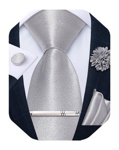 PRICES MAY VARY. 【Mens Tie Set】Men Satin Silver Tie +Lapel Pin Brooch+Tie Clip + Pocket Square + Cufflinks. It's a surprise gift for father, husband, son,brother and friends,and all loved ones on Father's Day,Christmas Day,Valentine's Day,Thanksgiving Day,Anniversary,birthday ect 【High-end Fabric】Made of high-end fabric, mens solid color silver necktie tie has a good sense of elegance and fashion. It is smooth and delicate to wear, lightweight and soft, and has significant anti wrinkle and wear- Bespoke Luxury Suit And Tie Accessories For Semi-formal Occasions, Designer Luxury Suit And Tie Accessories For Semi-formal, How To Store Ties, Pocket Square Size, Formal Tie, Silver Tie, Mens Tie, Cufflink Set, Cufflinks Wedding