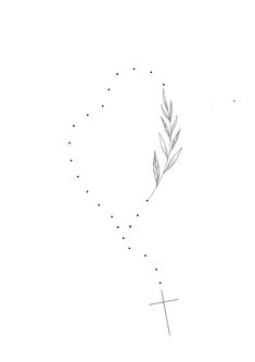 a drawing of a cross on the ground with dots in front of it and an arrow pointing up