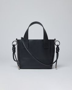 Sandqvist - Shoulder bag - Black - CECILIA Leather Shoulder Bag With Round Handle For On-the-go, Leather Satchel With Round Handle For Everyday Use, Everyday Leather Satchel With Round Handle, Classic Leather Box Bag With Palladium Hardware, Minimalist Leather Satchel With Detachable Handle, Leather Bag With Round Handle For Everyday Use, Leather Bags For Daily Use With Round Handle, Leather Bags With Round Handle For Daily Use, Black Leather Box Bag With Palladium Hardware