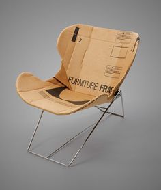 a chair made out of cardboard with the words furniture fair on it