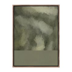 an abstract painting with green and white colors on the wall, framed in wood frame