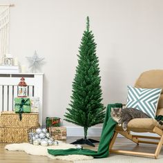 a cat is sitting on a chair next to a christmas tree and other holiday decorations