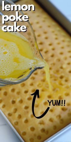 lemon poke cake is being poured into a pan