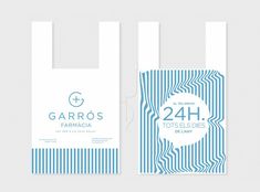 two white and blue shopping bags with the words garro's farmacia on them