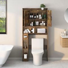 a white toilet sitting next to a bath tub in a bathroom