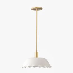 a white and gold pendant light hanging from a ceiling fixture with an oval shade on the top