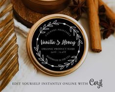 an image of vanilla and honey label on a candle holder next to cinnamon sticks, cloves and star anise