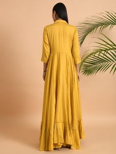 A shawl collared cotton silk maxi dress with flared and flounced bottom, side pockets, and long sleeves Garment measurements (in Inches): Small: Bust - 39", Waist - 29" Medium: Bust - 42", Waist - 32" Large: Bust - 45", Waist - 35" Length: 55-56", Sleeve length: 17" Fabric: Cotton Silk Color: Yellow Fit: Model height is 5'7" Model is wearing a size S Loose and comfortable fit. Instructions: Hand wash separately in cold water Note: Available in other colors Pants not included with the product Pan Yellow Fits, Silk Maxi, Silk Jacket, Colored Pants, Silk Maxi Dress, Large Bust, Shawl Collar, Small Bust, Cotton Silk