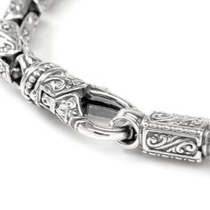 In 18th century Italy, no musician was as renowned as Niccolo Paganini. Created in carved sterling silver, Konstantino celebrates the virtuoso and creative passion of Paganini through this exceptional link bracelet. 8" long with lobster clasp to fit most wrists. Includes branded Konstantino gift packaging. Formal Engraved Link Bracelets, Luxury White Gold Chain Bracelet With Sterling Silver Clasp, Classic Sterling Silver Bracelet Engraved For Formal Occasions, Classic Engraved Sterling Silver Bracelet For Formal Occasions, Luxury Oxidized Chain Bracelet, Classic Formal Sterling Silver Engraved Bracelet, Timeless Engraved Sterling Silver Bracelet, Luxury Engraved Oval Link Bracelet, Ornate Sterling Silver Bracelets