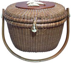 a wicker basket with wooden lid and handles