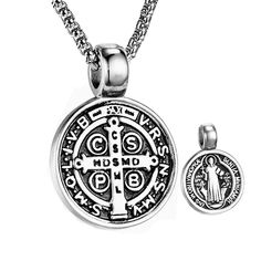 Embrace divine protection with our Serenity Shield Necklace. This powerful pendant features the revered St. Benedict medal, meticulously crafted in sleek stainless steel. The intricate design showcases the saint's figure surrounded by Latin inscriptions, believed to ward off evil and bring blessings. The bold, monochromatic style adds a contemporary edge to this timeless symbol of faith. Whether worn as a personal talisman or gifted to a loved one, this necklace serves as a daily reminder of spiritual strength and guidance. Vintage-inspired design with strong religious symbolism Premium 316L stainless steel - Lightweight, hypoallergenic and tarnish-resistant Retro chain included (24 inches length) Pendant 31mm x 22mm Saint Benedict Pendant - Symbol of Protection and Faith