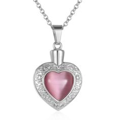 This beautiful piece of high quality jewelry is designed to hold a tiny amount of a loved one or pet's ashes, ensuring that there is always a part of them held close to your heart. This solid 316L Stainless Steel pendant is in a heart shape with a pink Czech crystal surrounded by detailed band design. Measuring approximately 2.5cm/1.18" in overall height and 2.5cm in width. The solid 316L Stainless Steel 'box' chain measures approximately 45cm (18"). Each Pendant comes beautifully presented in i Heart Cut Birthstone Jewelry For Keepsake, Keepsake Heart Cut Birthstone Jewelry, Pink Heart Pendant Jewelry For Keepsake, Pink Heart-shaped Engraved Jewelry, Pink Jewelry For Mother's Day Keepsake, Pink Jewelry For Mother's Day Gift, Pink Keepsake Jewelry For Mother's Day, Heart-shaped Engraved Jewelry For Remembrance, Heart-shaped Stainless Steel Keepsake Necklaces