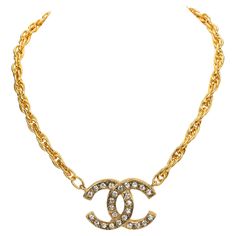 Chanel 70s collectible Gold Chain Rhinestone Necklace. Gold Plated with polish finish, signature interlocking CC logo, spring ring fastening. Size CC pendant 1.25” x 1.75”. Clear rhinestones. Comes with original box or duster. Chanel 70s, Chanel Pendant, Royal Diamond, Vintage Chanel Bag, Vintage Choker Necklace, Chanel Suit, Crystal Choker Necklace, Gold Charm Necklace, Rhinestone Ring