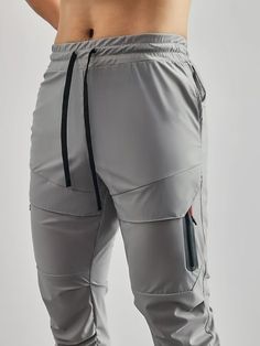 This is AHA moment!  This Tactical Cargo Jogger is made with four-way stretch and cooling tech fabric. Make sure to feel comfortable throughout your workout and throughout the day.  Product Details   4-way stretch fabric with cooling tech Ultra lightweight and moisture-wicking Elastic waistband with drawcord designs that offer support and comfort Breathable and sweat-wicking fabrics for indoor and outdoor activities High rib hems Engineered 5 pockets and a towel holder  Fabric & Care   Fabric： 8 Men Gym Outfit, Aha Moment, Sports Tshirt Designs, Track Pants Mens, Pants Outfit Men, Cool Outfits For Men, Cargo Joggers, Men Fits, 4 Way Stretch Fabric