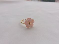 Pink Mother of Pearl Flower Ring, Shell flower Ring, Floral Ring, Gold ring, Wire wrapped Ring, bridesmaid gift, birthday gift, gift for her - Size The flower measures 10mm. Size US/UK US 2 ~ US 12 UK I ~ UK X pls leave us a note if you need other size. - Materials Gold plated brass. Mother of Pearl. - It will be packed in a gift box. - Handmade time: 3-5 days( time from payment to shipment) Payment: Paypal. Jewelry with daily wear and bath is not returnable,refundable or replaceable. Electropla Spring Wedding Flower Ring, Spring Rose Gold Flower Ring, Flower-shaped Wedding Rings For Spring, Flower Shaped Wedding Rings For Spring, Spring Wedding Rings In Flower Shape, Spring Wedding Rings With Flower Shape, Spring Wedding Rose Gold Flower Ring, Delicate Flower Ring For Spring Gift, Pink Flower Ring For Spring Wedding