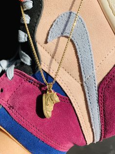 Nike Necklace — Divine Individual Nike Necklace, Sneaker Necklace, Jordan Ones, Gold Lariat Necklace, Chic Sneakers, Advantages And Disadvantages, Jewelry Fashion Trends, Jewelry Lookbook, Air Jordan Shoes