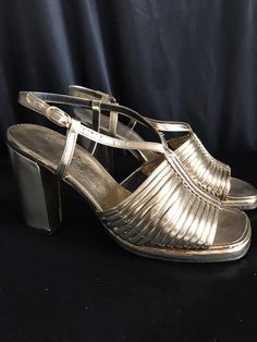 Vintage Made it Italy Leather soles Metallic gold leather Chunky heel & small front platform Formal or informal Size 6 Gold Block Heels With 4-inch Heel For Summer, Gold Sandals With 4-inch Heel And Closed Toe, Gold Open Heel Block Heels For Evening, Gold Sandals With Block Heel, Chic Open Heel Gold Block Heels, Gold Block Heels For Formal Summer Events, Gold Open Toe Block Heels With Padded Heel, Chic Gold Block Heels With Open Heel, Chic Gold Open Heel Block Heels