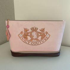 Brand New With Tags Travel Cosmetic Bag Additional Bottom Compartment Includes 1 Travel Toiletry Bottle Approximate Measurements: 14” Across The Top 12” Across The Bottom 9” Height 6” Wide On The Bottom Designer Pink Pouch For Everyday Use, Luxury Pink Rectangular Cosmetic Bag, Luxury Pink Pouch For Everyday Use, Designer Pink Travel Pouch, Luxury Pink Cosmetic Bag For Everyday Use, Luxury Pink Clutch Bag, Luxury Pink Bag With Zipper Pouch, Chic Pink Cosmetic Bag With Removable Pouch, Pink Clutch Pouch With Dust Bag