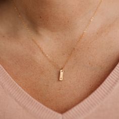 A perfect sleek + dainty way to hold your favorite souls initials close to your heart each and every day! DETAILS Each charm measures 4mm x 12mm. Available in Sterling Silver, 14k Yellow Gold Filled, 14k Rose Gold Filled, Solid 14k Yellow Gold, or Solid 14k Rose Gold. The lobster clasp and chain extender are optional add-ons. Charm compatible: this chain is compatible with our add-on charms! Initial Tag Necklace, Metal Tags, Personalized Pendant, Chain Extenders, Tag Necklace, Personalized Jewelry, Custom Jewelry, Gold Filled, Jewelry Pieces