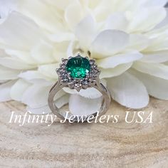 Emerald Halo Ring 14k White Gold, Vintage Emerald Engagement Ring, Oval Halo Ring With Emerald, May Birthstone Ring, Emerald Jewelry #6719 We feature the finest quality lab grown emeralds in the world. The properties of lab-grown are physically, chemically and visually identical to natural, just grown in a lab setting. Emerald is the birthstone of May -Approximate total carat weight: 2.50ctw diamond equivalent -Center Stone Size: 9x7mm approx. 2.10ct. diamond equivalent -Center Stone Shape: oval Gia Certified Oval Diamond Ring For Anniversary, Gia Certified Cluster Halo Ring For Anniversary, Gia Certified Round Emerald Anniversary Ring, Gia Certified Oval Ring In Fine Jewelry Style, Gia Certified Oval Emerald Cluster Ring, Fine Jewelry Oval Rings Gia Certified, Gia Certified Oval Fine Jewelry Rings, Halo Diamond Ring For May Birthstone, Anniversary Halo Ring With Cluster Center Stone