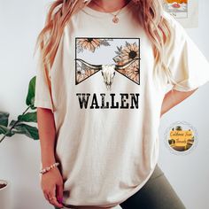 This vintage inspired Wallen Tee is the perfect gift for the country music lover or your favorite everyday shirt.  A fully customizable tee made 100% with ring-spun cotton. The soft-washed, garment-dyed fabric brings extra coziness to your wardrobe while the relaxed fit makes it an excellent daily choice. The double-needle stitching throughout the tee makes it highly durable while the lack of side-seams helps the shirt retain its tubular shape. .: 100% ring-spun cotton .: Medium fabric (6.1 oz/yd² (206.8 g/m .: Relaxed fit .: Sewn-in twill label ⇒⇒ CARE INSTRUCTIONS Do not bleach. Do not dry clean. Wash inside out in cold water. Lay flat to dry. Iron inside out. Never iron directly on the design. Products are unisex and relaxed fit. You may consider a down size for a more feminine look. Pl Country Style Short Sleeve T-shirt For Spring, Country Style Pre-shrunk Cotton T-shirt, Country Style Cotton Pre-shrunk T-shirt, Country Style Short Sleeve Summer T-shirt, Country Style Cotton T-shirt, Country Style White Cotton T-shirt, Country Style White Graphic T-shirt, Country Style Graphic Print T-shirt For Spring, Summer Crew Neck T-shirt For Country Concerts