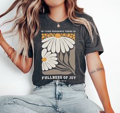 Embrace your faith and style with our Boho Floral Faith tshirt, featuring the uplifting bible verse from PSALM 16:11. This elegant and comfortable shirt blends a beautiful boho floral design with a powerful message of spiritual growth. Perfect for daily wear, it's a stylish reminder to embrace grace in every step. Available on tshirt, sweatshirt, hoodies, tote bags and mugs: https://www.etsy.com/shop/TheNims?search_query=Boho+Flower For other Christian items, click here: https://www.etsy.com/sho Boho Christian Shirts, Spiritual Shirt Ideas, Etsy Tshirts Design, Bible Tshirt Designs, Boho T Shirt Design, Boho Tshirt Design, Floral Shirt Design, Christian Items, Etsy Shirts